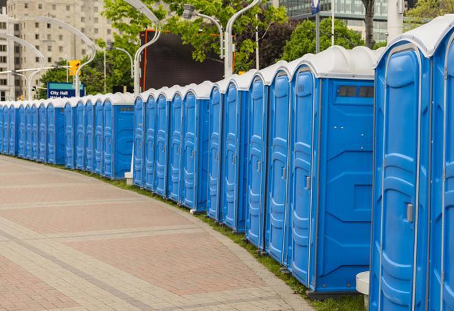 a row of sleek and modern portable restrooms at a special outdoor event in Cascade